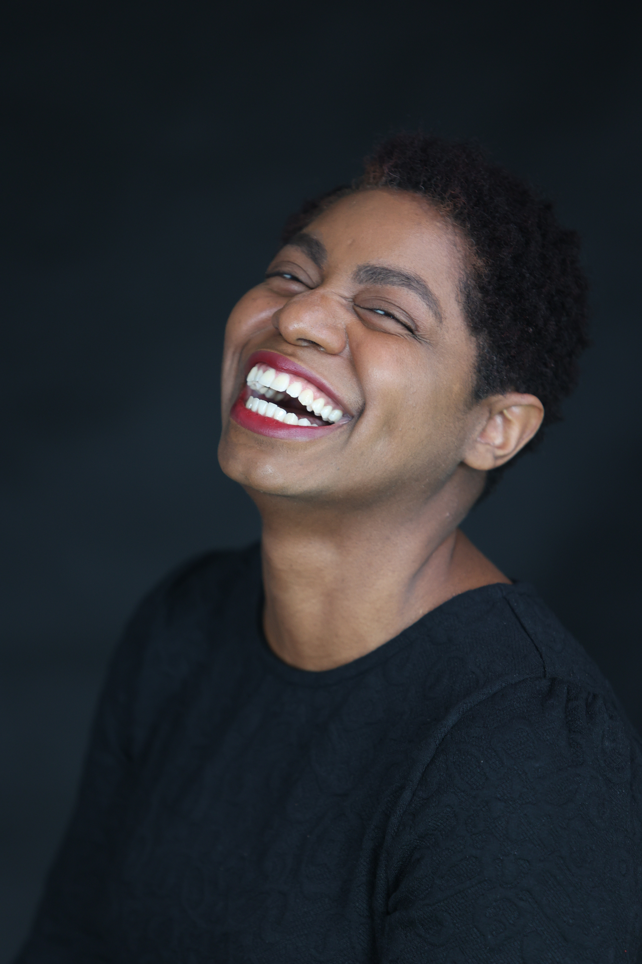 Laura Smith, founder of UPWARD Rooted, laughing